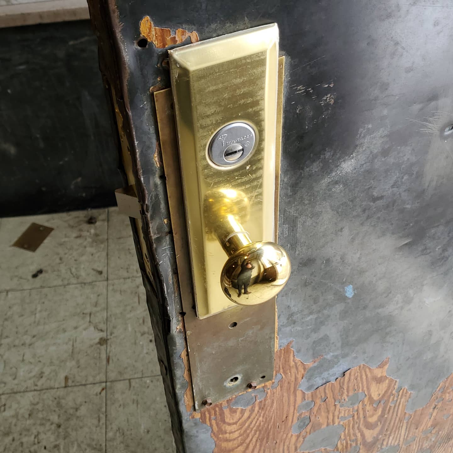 Brass commercial door lock repaired by FirstCall Locksmith
